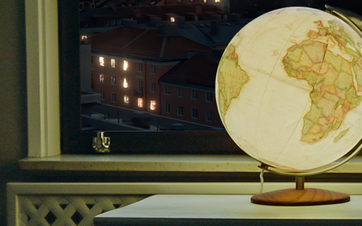 Lämmintä valoa hehkuva karttapallo